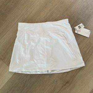White athletic skort never worn and tags still on kids size XL